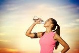 sporty girl  drinking water 