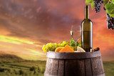 White wine with vineyard on background 