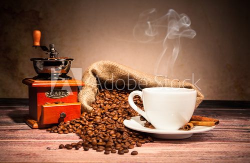 Coffee still life with wooden grinder