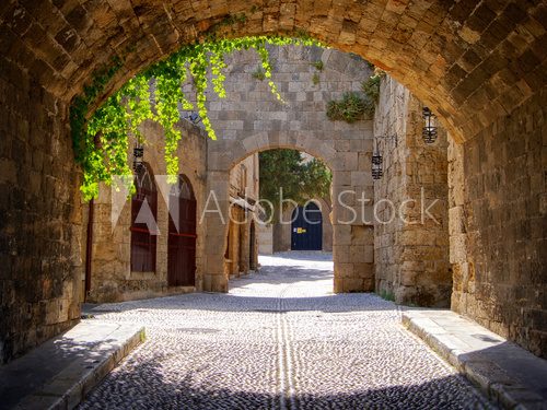 Medieval arched street in the old town of Rhodes, Greece