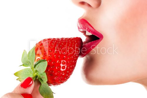 sexy woman eating strawberry, sensual red lips
