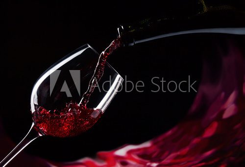 bottle and glass with red wine