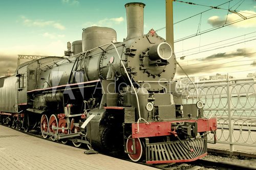 Old steam locomotive at station