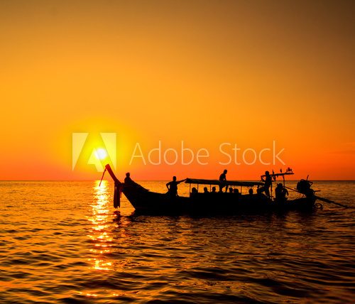 Boat in the sunset near Koh Phi Phi of Thailand