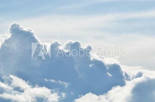 classic cloudscape. Blue sky with ornamental clouds
