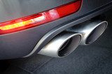 Close up of a car dual exhaust pipe 