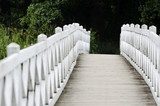 patterned wooden white foot bridge 