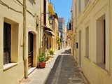 Narrow street in city of Rethymno, Crete, Greece 