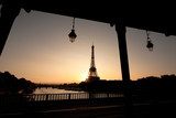 Silhouette of Eiffel tower and a bridge 