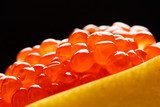 red caviar on the lemon 