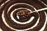 teaspoon with ground coffee