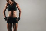 Athletic woman with strong abdominal muscles