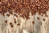 Coffee beans on rustic wooden background