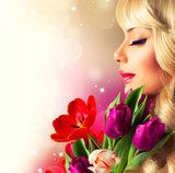 Beauty Woman with Spring Flower bouquet 