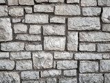Old gray stone wall background texture 