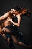 romantic tango dancing couple on black 