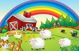 A farm with many animals and a rainbow in the sky 