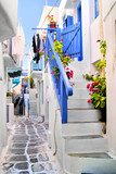 Beautiful whitewashed street in the old town of Mykonos, Greece 