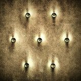 Luxury and grungy background of leather with metal buttons 