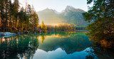 Аabulous autumn sunrise of Hintersee lake. Amazing morning view of Bavarian Alps on the Austrian border, Germany, Europe. Beauty of nature concept background.