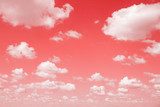 Gradient Living Coral color of the Year 2019. Sky with fluffy clouds. Retro toned abstract background, minimal.