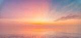 Inspirational calm sea with sunset clouds sky. Meditation ocean and sky background. Colorful horizon over the water. Relaxing seascape skyscape sun rays. Panoramic nature horizon dream fantasy ecology