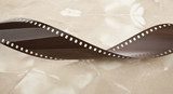 Zanurzona taśma filmowa w sepii
