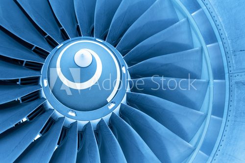 Titan blades of jet plane engine, blue light