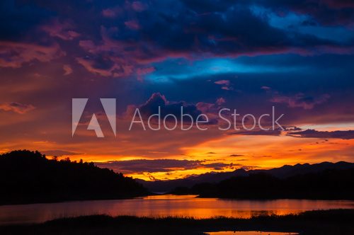 ิcolorful sky  on the lake view and mountain background