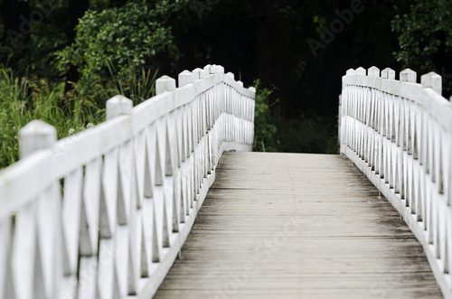 patterned wooden white foot bridge
