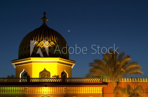 Night minaret under the moon