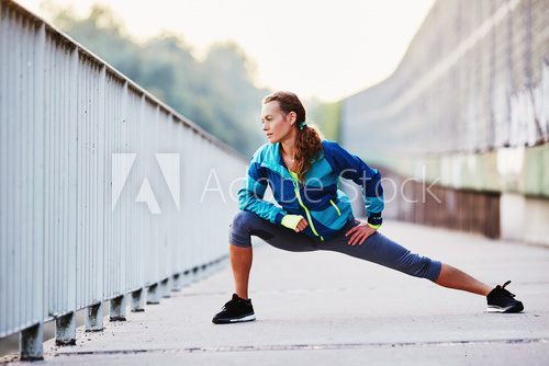 Woman stretching before running