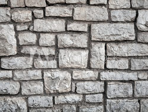 Old gray stone wall background texture
