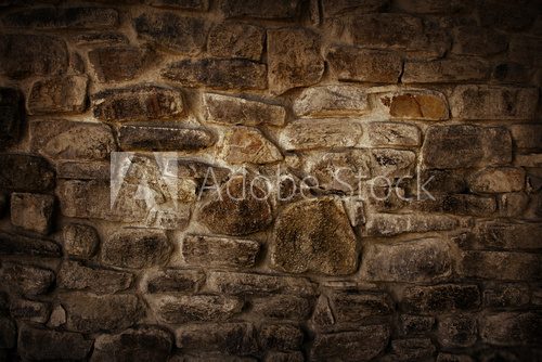 Grunge brown stone wall textured background