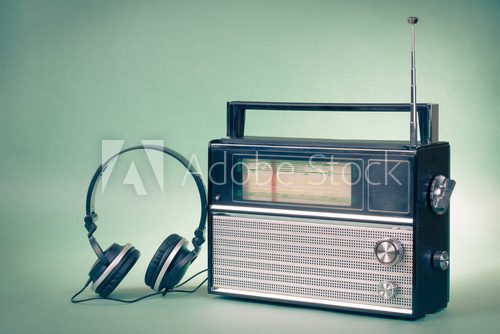 Old retro radio and headphones conceptual photo