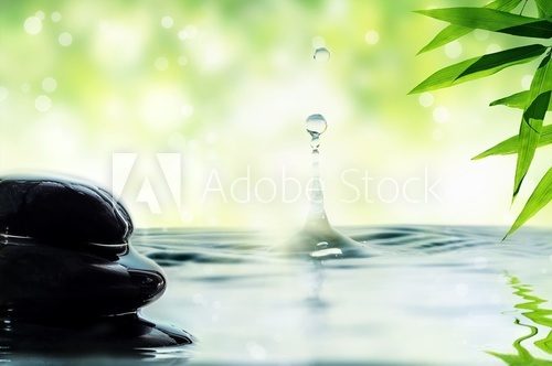 Pebbles, bamboo and drop of water.