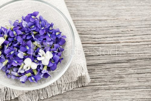 Edible violets in bowl