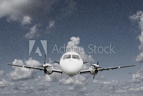 Airplane in the rain