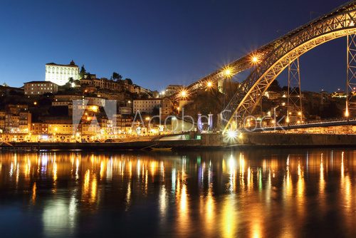 Dom Luis bridge and Porto at dusk