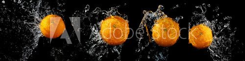 Set of fresh oranges in water splash