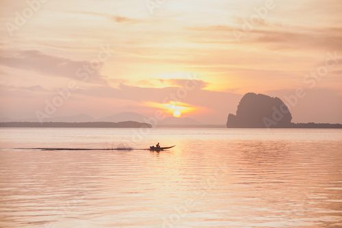 Amazing colorful sunrise at tropical islands. Beautiful cloudscape over the sea. Silhouettes in sunlight.Asia, Sunset, Beach, Sky, Dusk