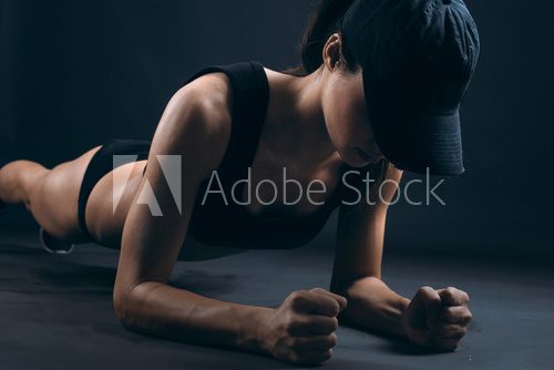 Sporty and attractive woman do fitness exercise