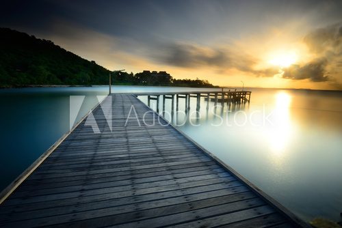 The wooden bridge with sunrise at national park Khao Leam Ya - M