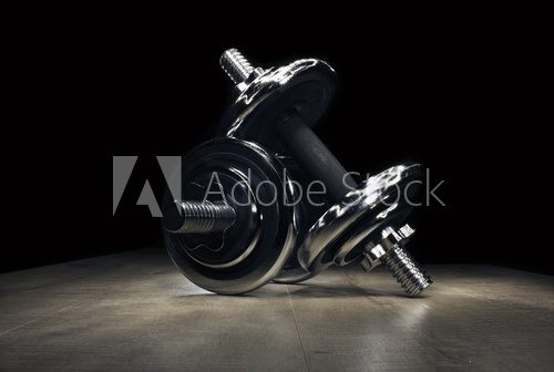 dumbbell on the wooden floor