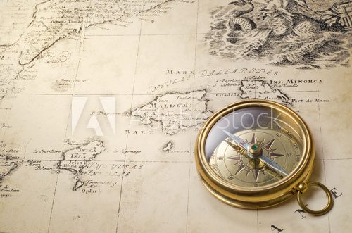 old compass and rope on vintage map 1732