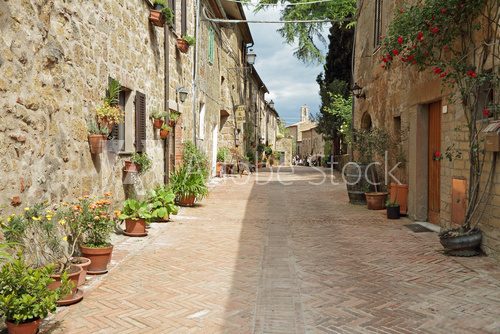 street paved with brick in old italian borgo Sovana in Tuscany,